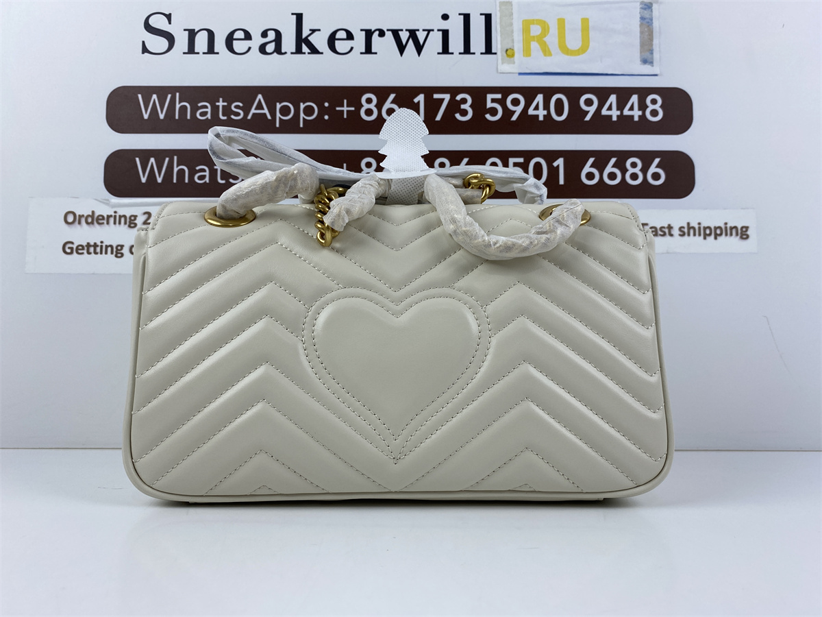 G*u*i pure white bag