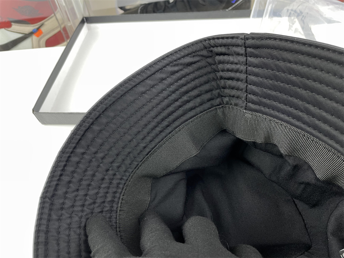 Pra*a black bucket hat